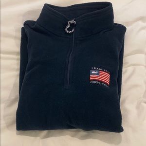 Navy blue fleece pullover with detailing
